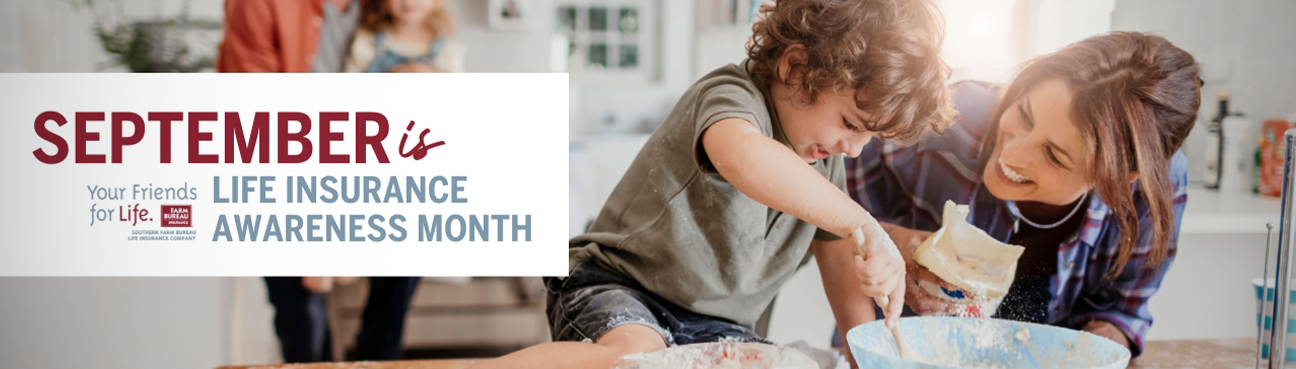 Mother smiling with child in the kitchen